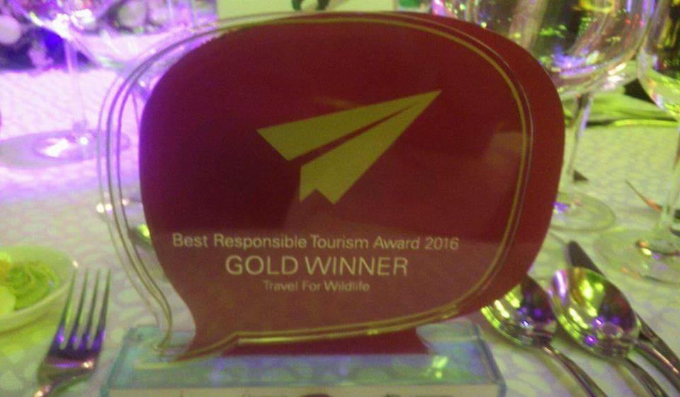 Cristina's award sitting on a table at the award ceremony in Sri Lanka (photo snapped on the phone of Matt Gibson, president of the Professional Travel Bloggers Association.)