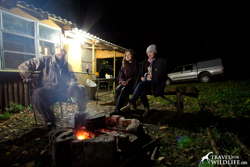 Campfire at Slava's. "Sit down please."