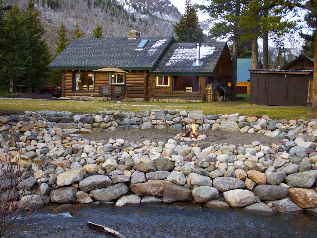 A log cabin by the creek