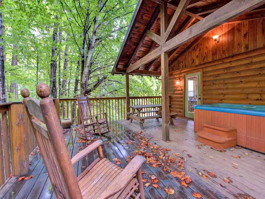 Private porch surrounded by woods, Gatlinburg cabins on VRBO