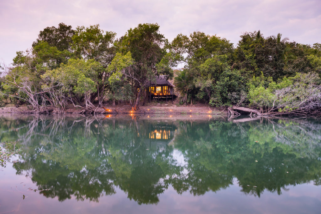 chalet on river shore