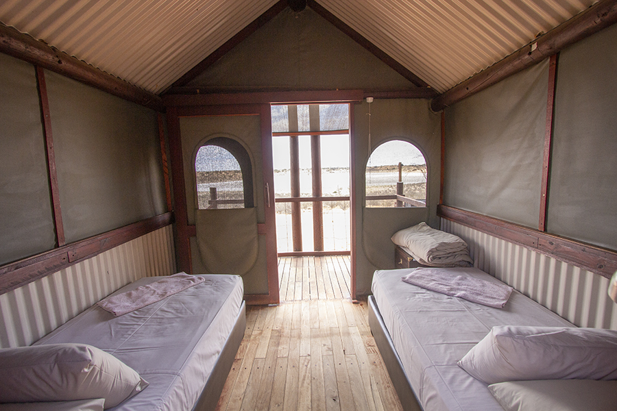 a tent with two beds