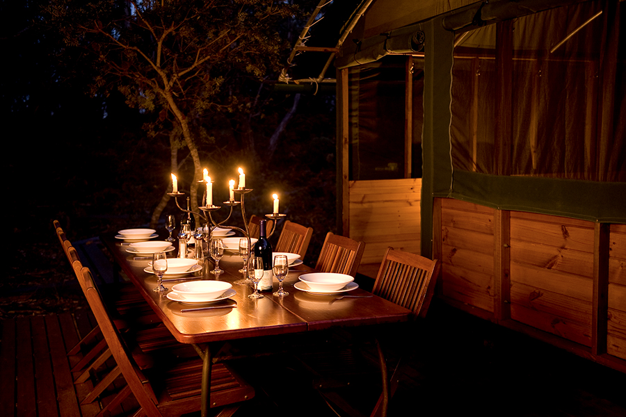 table set for dinner by candlelight