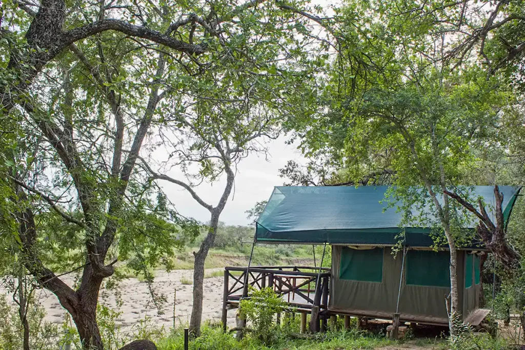 safari tent by a dry river at Tamboti, Kruger